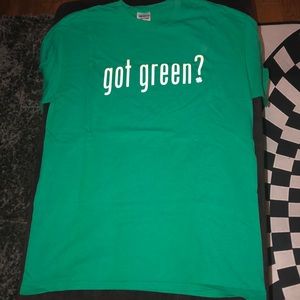 Worn once, gently loved tee says “got green”